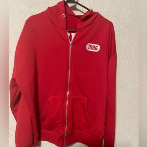 Red zip up cotton jacket size Large
Limited Edition 1986 on the back of jacket